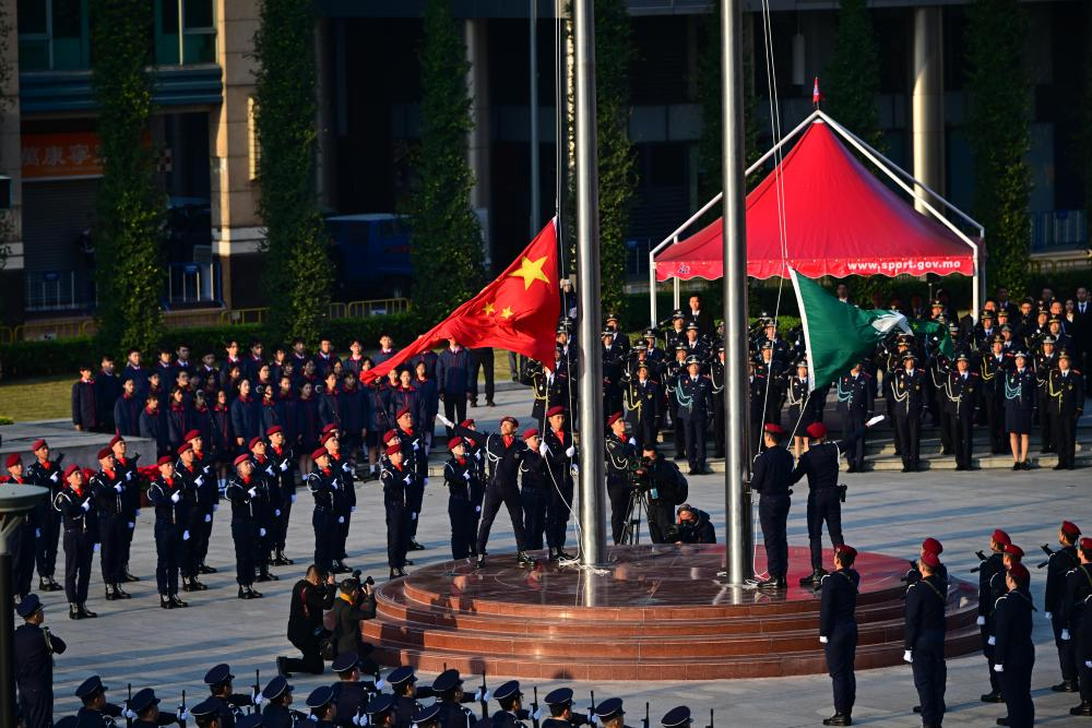 12月20日，澳門特別行政區(qū)政府隆重舉行升旗儀式，慶祝澳門回歸祖國25周年。　